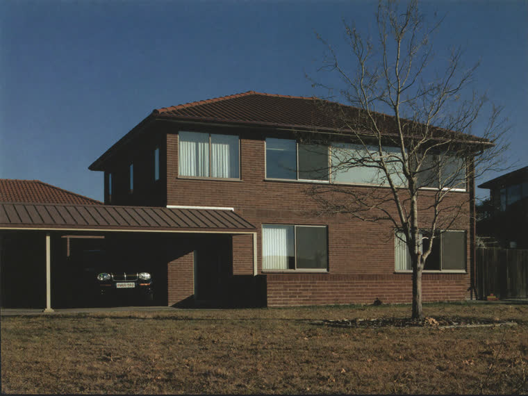 The front elevation of an ordinary Australian brick veneer house.
